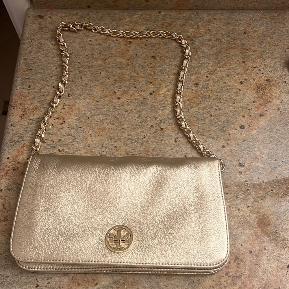 TORY BURCH GOLD.